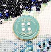 Sew on sew forth button needle minder
