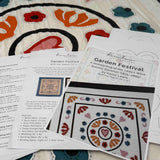 Garden Festival quilt pattern featuring Arts and Crafts inspired floral motifs