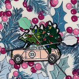 Festive magnetic needle minder